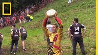 Watch a Downhill Cheese-Chasing Competition in Britain | National Geographic