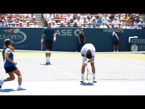 Thomas Berdych hits Michael Llodra in the face