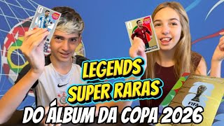 NOSSO ÁLBUM ESTÁ QUASE COMPLETO! Abrindo figurinhas da COPA 2026 | ENZO E NIC