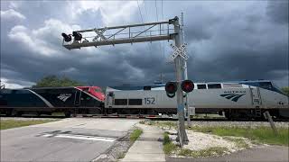 Carr Street Railroad Crossing, Palatka, FL
This was the first train and railroad crossing I recorded on June 26, 2025. Before that, I met up with a few friends in Orlando, FL, with my main goal is to document the rest of Orlando, the CSX Auburndale Sub, and many other parts. On the way back home, while also stopping for a layover, I decided to document the rest of the CSX Sanford Subdivision, and while I did do a great job into Palatka, I would come across the first train that day, which was the Silver Meteor! Pretty much the only time the CSX Sanford Sub sees these days is all of the scheduled Amtrak trains, along with occasional locals and as needed re-routes, but that’s it really, as all of the main through-freight traffic goes via the Wildwood Sub since the state acquired the Sanford Sub and SunRail operates from DeLand to Poinciana, but I believe this line will still be around for many, many, years/decades to come as long as Amtrak still has service on it.
Oh, and big thanks to @freebrickproductions for helping me get this line documented!
Crossing info:
Signal on the left: 4 - 12x20 older Modern Industries incandescents, 6 - 12x24 newer Modern Industries incandescents, a Siemens Sticker Style 2 gate mechanism, 4 NEG LED gatelights, and an NEG E-Bell.
Signal on the right: 2 - 12x24 Safetran incandescents (1 Hawker-Safetran), 2 - 12x24 newer Modern Industries incandescents, 4 - 12x20 older Modern Industries incandescents, a Siemens Sticker Style 2 gate mechanism, 4 NEG LED gatelights, and an NEG E-Bell.
Location:
Carr Street
Palatka, Florida
Locomotives:
AMTK 152 - P42DC
AMTK 188 - P42DC
Filmed June 26, 2025
Camera used: iPhone 14 Pro
Intro & Outro Song: Sea of Life by Martin Riopel
Licensed by premiumbeat.com Carr Street Railroad Crossing, Palatka, FL