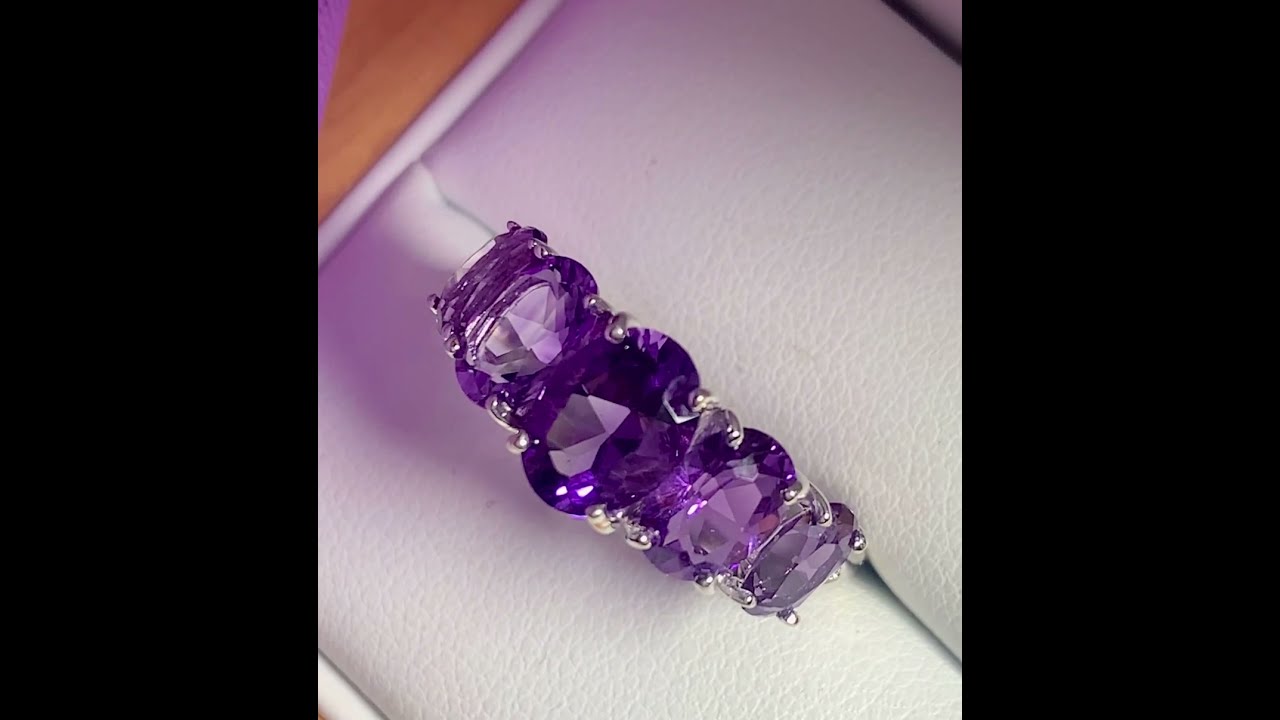 Oval purple amethyst sterling silver eternity or dress ring