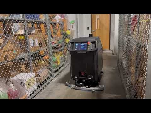 Industrial autonomous scrubber in a warehouse