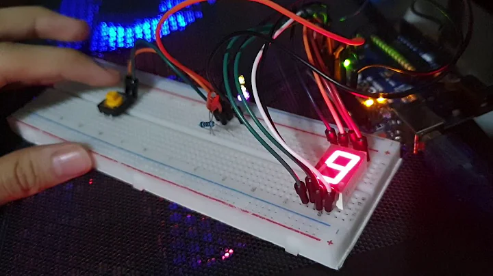 Arduino 7 segment - 0 to 9 then count stop when switch is pressed