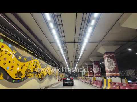 Driving through the colourful underpass at Bharat Mandapam in New Delhi