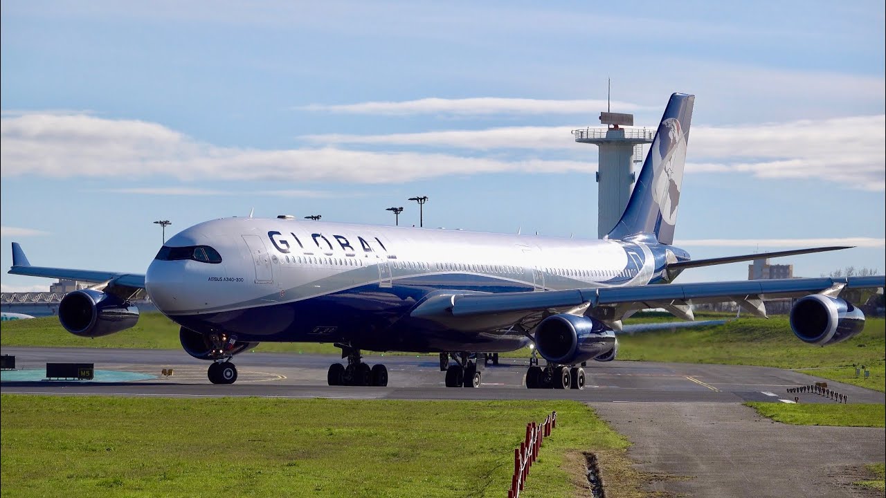 A340-300 Global Airlines Takeoff from Lisbon Airport operated by HIFLY