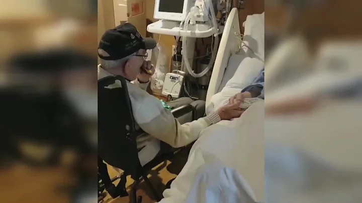 World War II veteran plays harmonica for his dying friend and fellow veteran