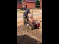 plowing the land with a mini tractor Mp3 Song