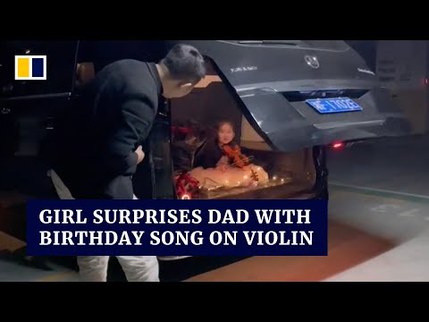 Chinese girl hides in car boot to surprise father by playing birthday song on violin