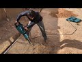 Digging in the caliche soil of the Arizona desert