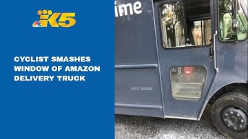 Video shows bicyclist smashing window of Amazon delivery van