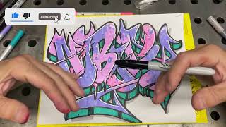 Piecing the word nobody in graffiti style