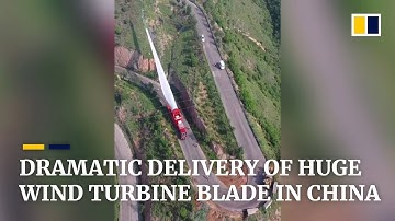 Dramatic delivery of huge wind turbine blade in China