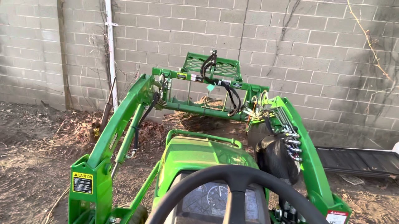 My review of the frontier av20f grapple on John Deere 1025r YouTube