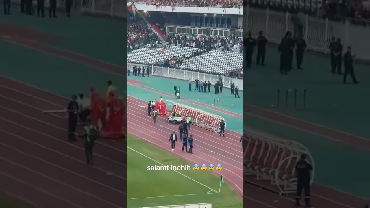 Spectators fall from the stands in an Algerian stadium