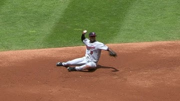 MIN@CLE: Nunez fires to first while sitting down
