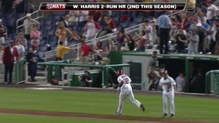 Harris hits a two-run homer in the 12th