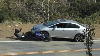 Rider Uninjured after Collision with Car