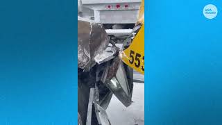 Driver walks through wreckage after 100-car pileup on I-196