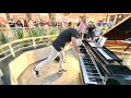 Coldplay clocks piano shopping mall