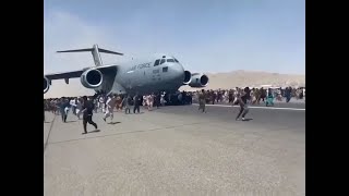 Must Watch: Afghans Try to Flee Kabul Hanging Onto U.S. Military Jet