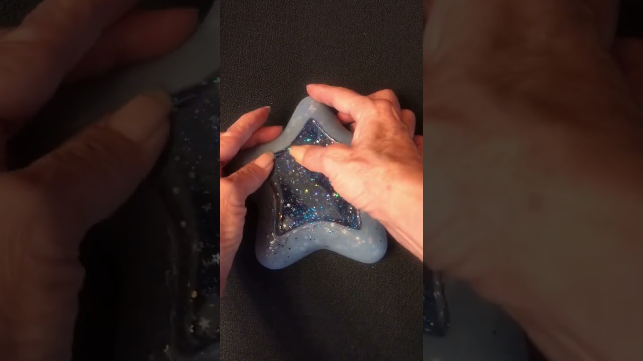 ASMR resin demold of  star shaped glitter tray. Snapping audio & sparkly glitter.