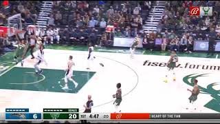 Point Giannis finds Hill with the bounce pass in transition