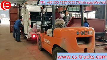 ISUZU garbage compactor truck into shipping container for delivery