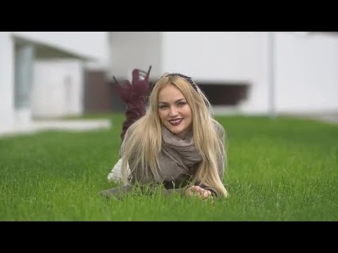 Girl Lying On Green Lawn Stock Video
