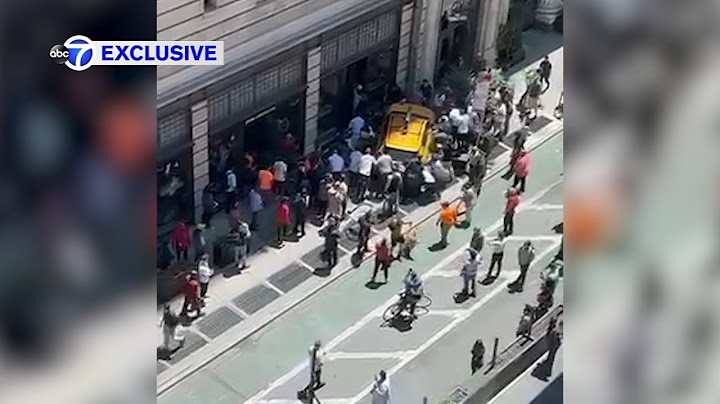 Taxi jumps curb, plows into pedestrians; group lifts cab off victims