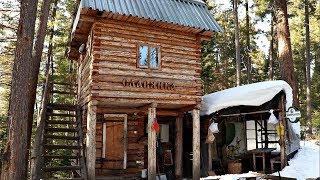 Hike in the woods to a 2story log cabin  2