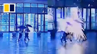 Pedestrians escape death after being struck by lightning in China
