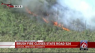 Brush fire closes State Road 524