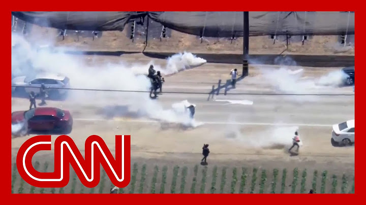 Watch intense standoff outside California farm between protesters and federal agents
