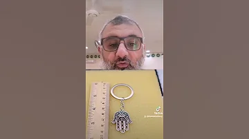 حكم تعليق الخرزه الزرقاء أو الكف 