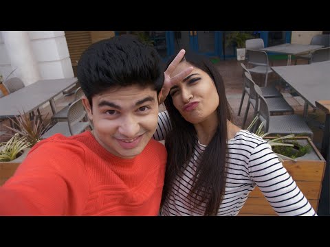 young-attractive-couple-taking-funny-selfies-together-on-valen...-|-indian-stock-footage-|-knot9