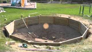 Inground Trampoline by Outdoor Pool and Spa
