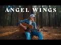 Logan michael  angel wings official