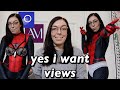 reviewing lingerie in a Spiderman suit