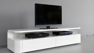 Our editors enjoyed searching for modern TV stand design ideas that can organize, wow and dress up any home.