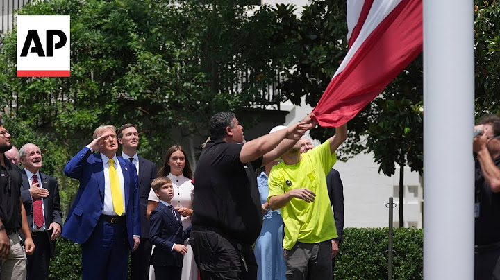 Trump watches US flag being raised on new pole at the White House