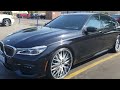 executive bmw 750I clean on 24's staggered rims