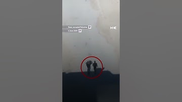 Israeli media posts footage of Israeli army targeting two young Palestinian men carrying aid