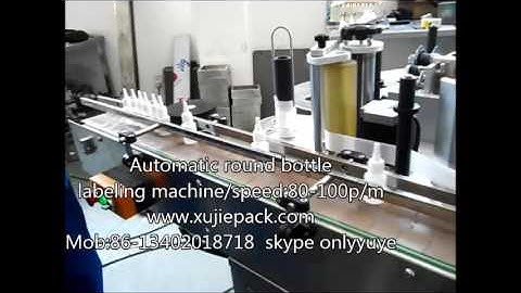 Round bottle labeling machine  For Bottles Install Teaching Video