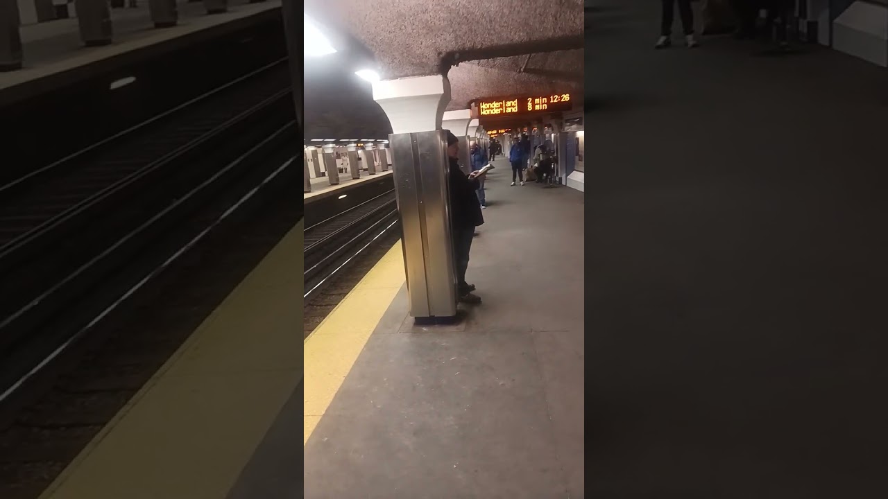 Brother Chris preaching from the Bible Boston subway 