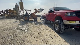 Dump trailer load after slip plate application