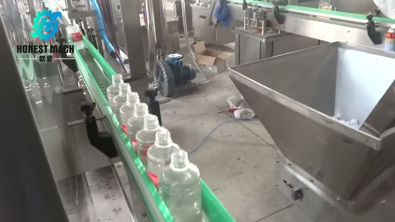 alcohol filling machine,it can work for different size bottle at same machine,you deserve one