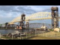 Soo lift bridge closing for train and opening for boat