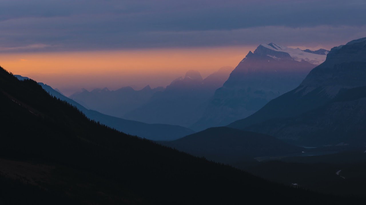 sunset over the mountains timelapse   Stock Video Footage   4K 4K