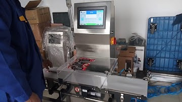 online check weigher with air jet rejector