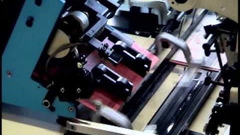 Pitney Bowes (Sure-Feed)  EI and EX feeders on a swing arm inserter